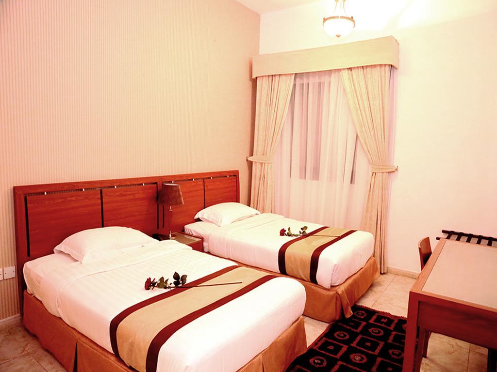 Arcadia Hotel Suites Шарджа Стая снимка