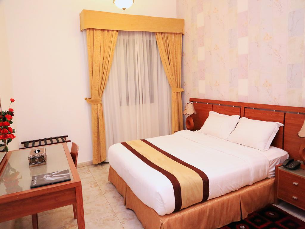 Arcadia Hotel Suites Шарджа Стая снимка