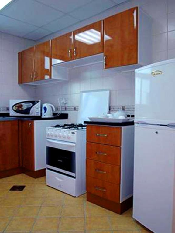 Arcadia Hotel Suites Шарджа Стая снимка